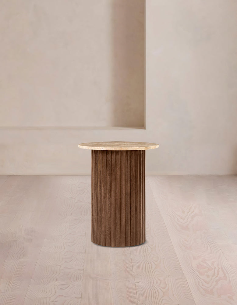 Wooden side table against a beige wall