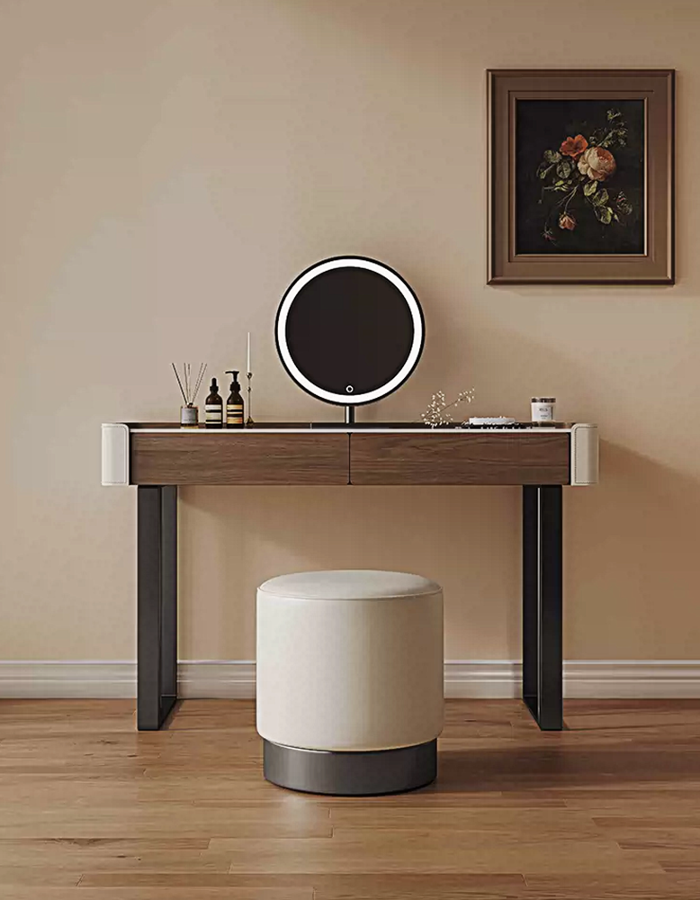 Dressing table with round mirror and stool in a room setting
