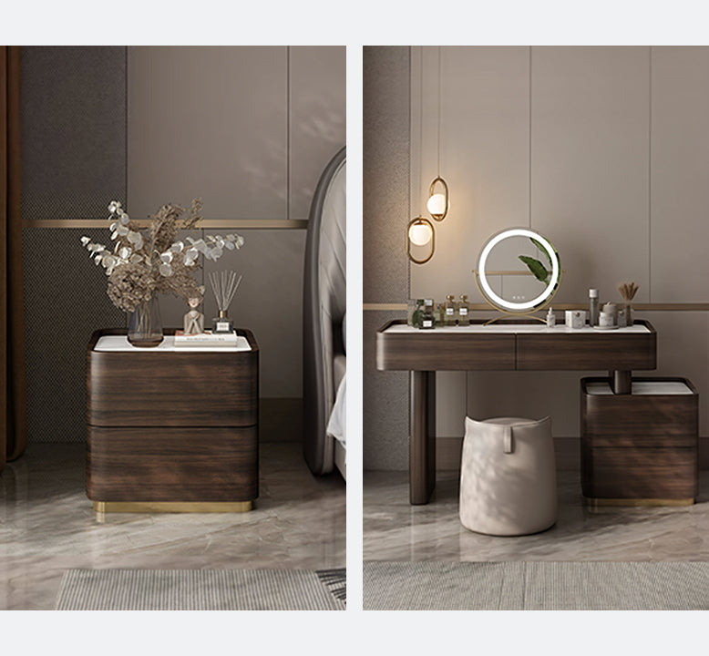 Bathroom setup with wooden vanity, mirror, and decorative elements.
