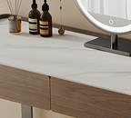 Dressing table with a mirror and decorative items on a neutral background