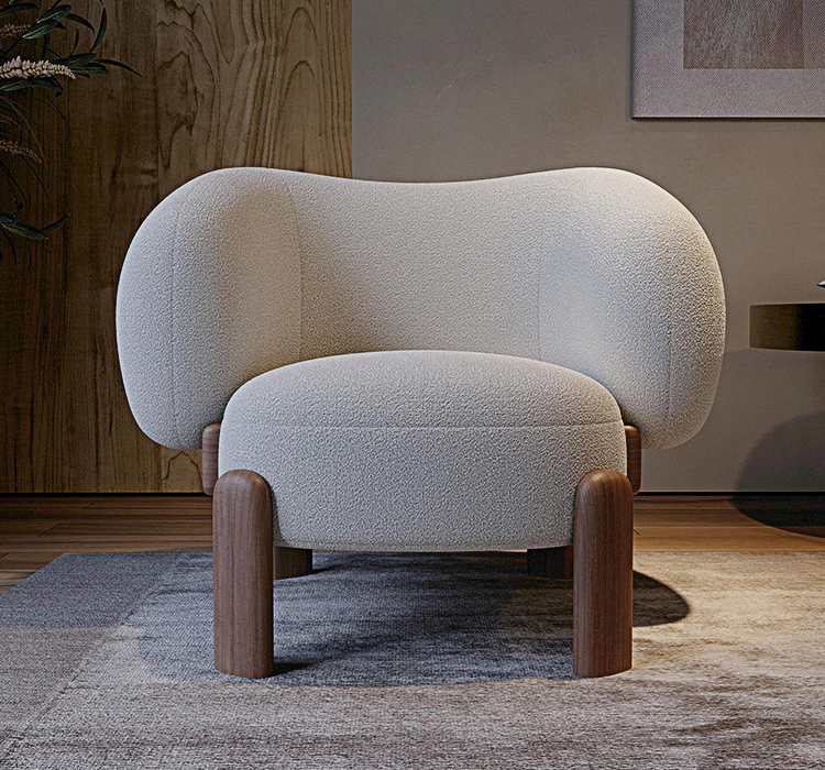 Modern armchair with wooden legs in a room setting