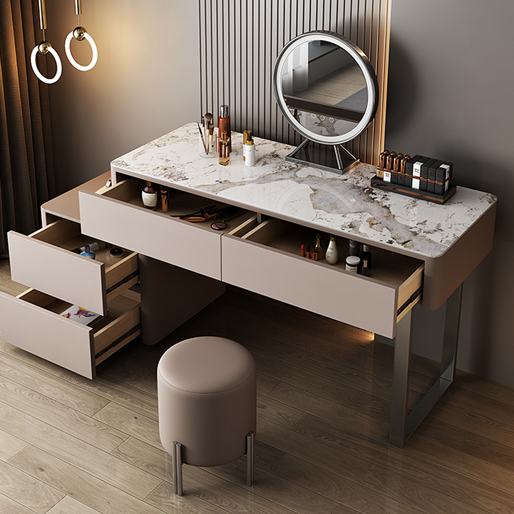 Modern vanity table with marble top and round mirror in a room setting.