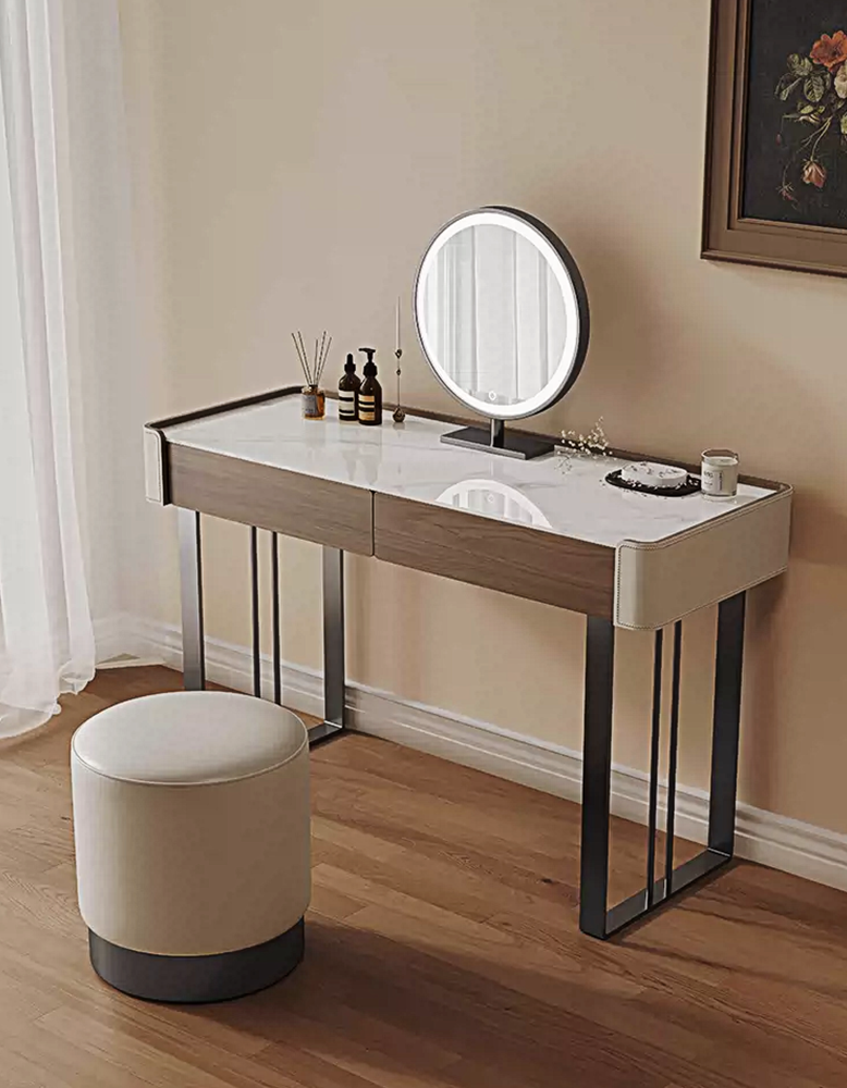 Dressing table with round mirror and stool in a room setting