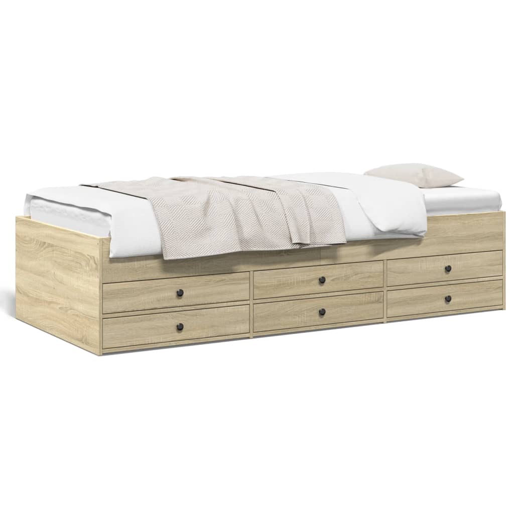Wooden bed with white bedding and multiple drawers on a white background