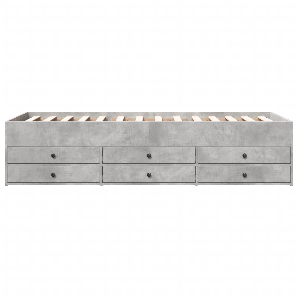 Gray bed frame with multiple drawers on a white background