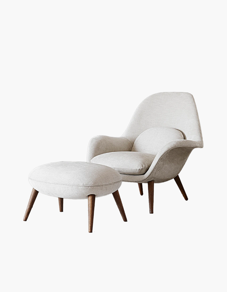 White armchair with ottoman on a white background