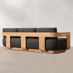 Sofa with wooden frame and gray cushions on a plain background