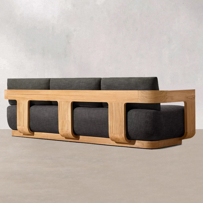 Sofa with wooden frame and gray cushions on a plain background
