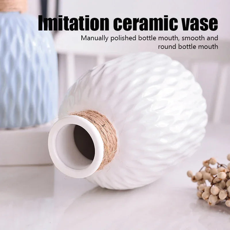 White ceramic vase with textured design on a light background