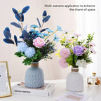 Decorative floral arrangements in vases on a table with a neutral background