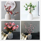 Four different floral arrangements in textured vases on a plain background