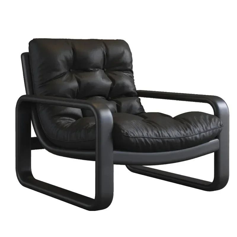 Black leather armchair on a white background