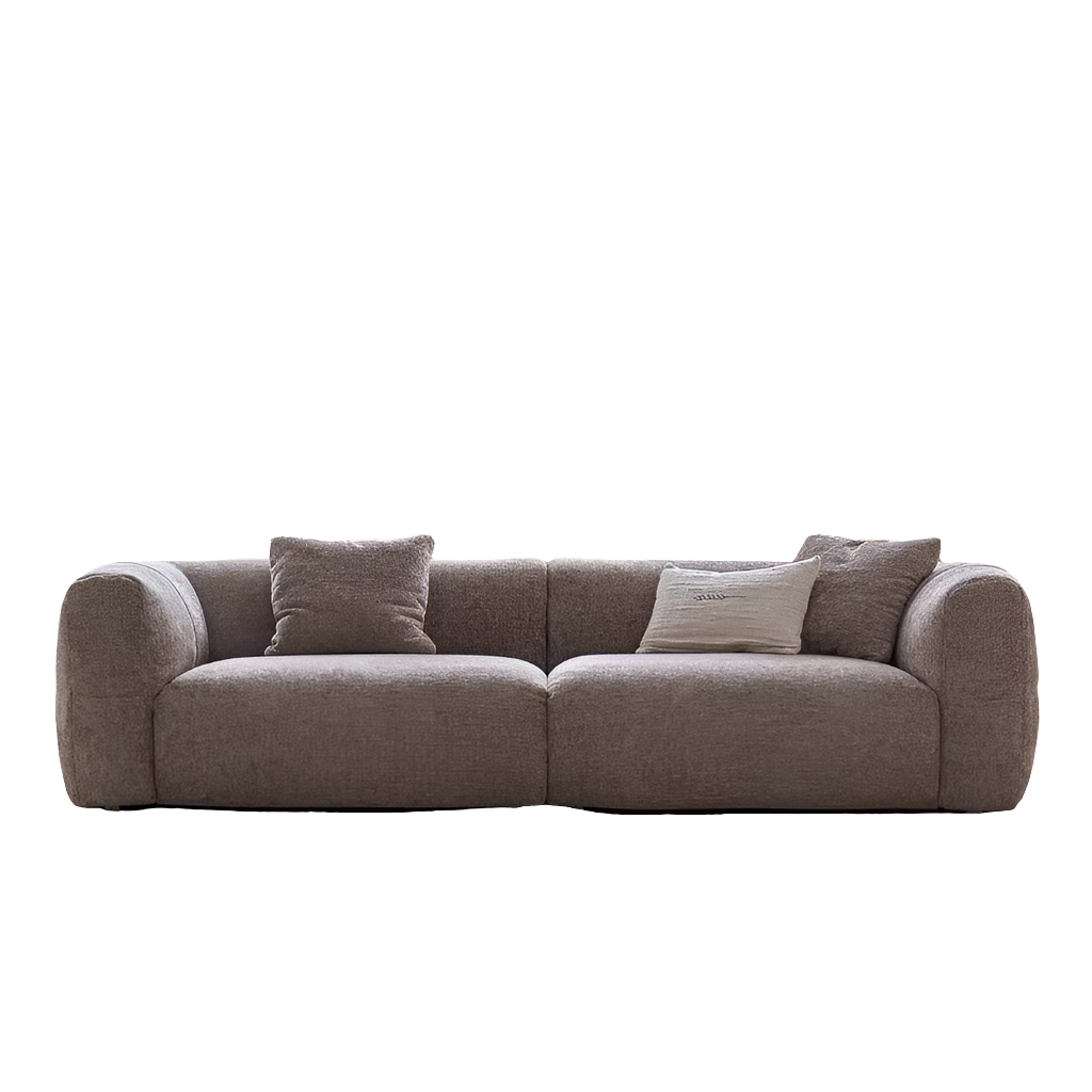 Brown sofa with cushions on a white background