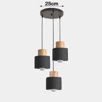 Three-tiered pendant light with black and wooden shades on a white background, showing measurement of 25cm.