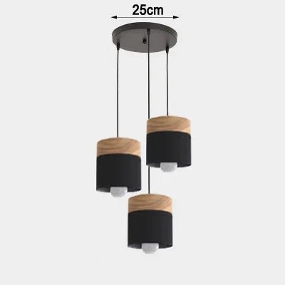 Three pendant lights with black and wood accents on a white background, showing measurement '25cm'.