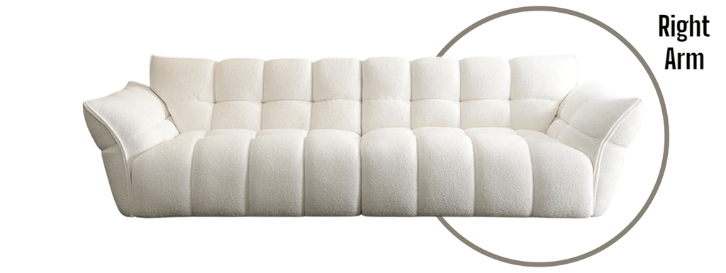 White sofa with a focus on the right armrest on a white background