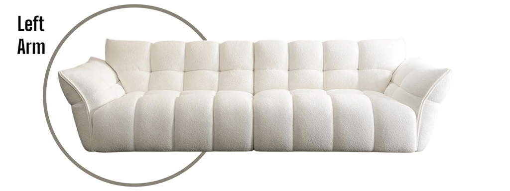 White sofa with a circular highlight on the left armrest against a white background
