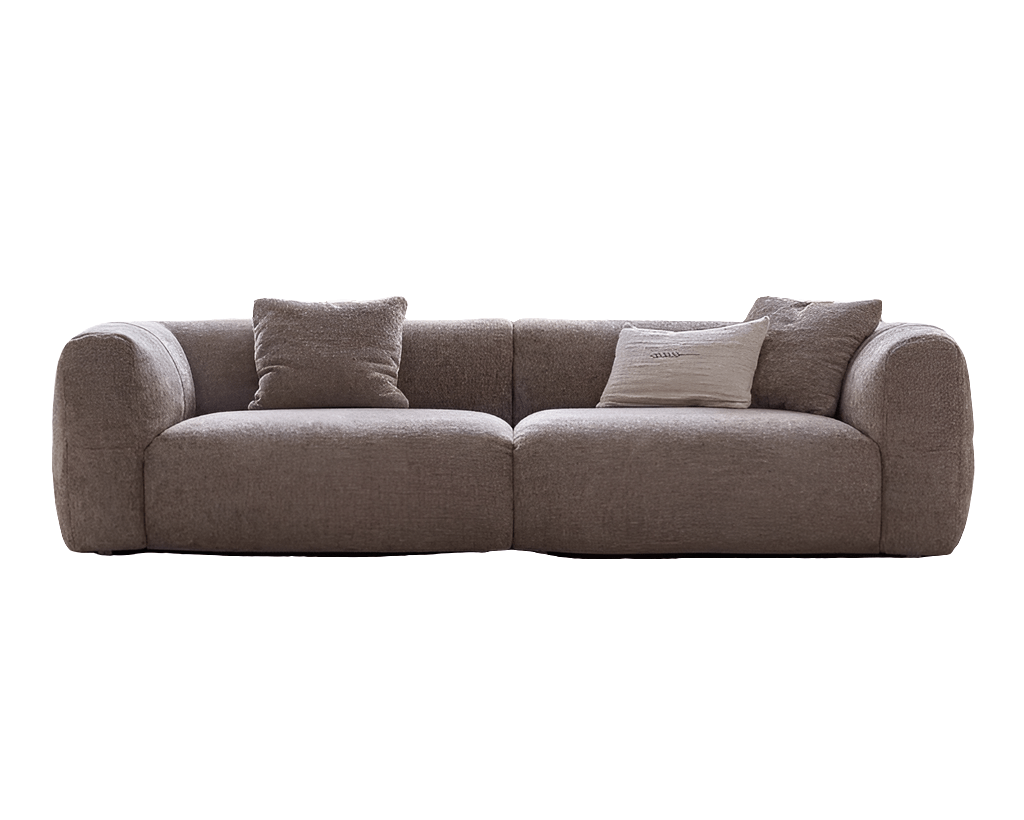 Brown sofa with cushions on a white background