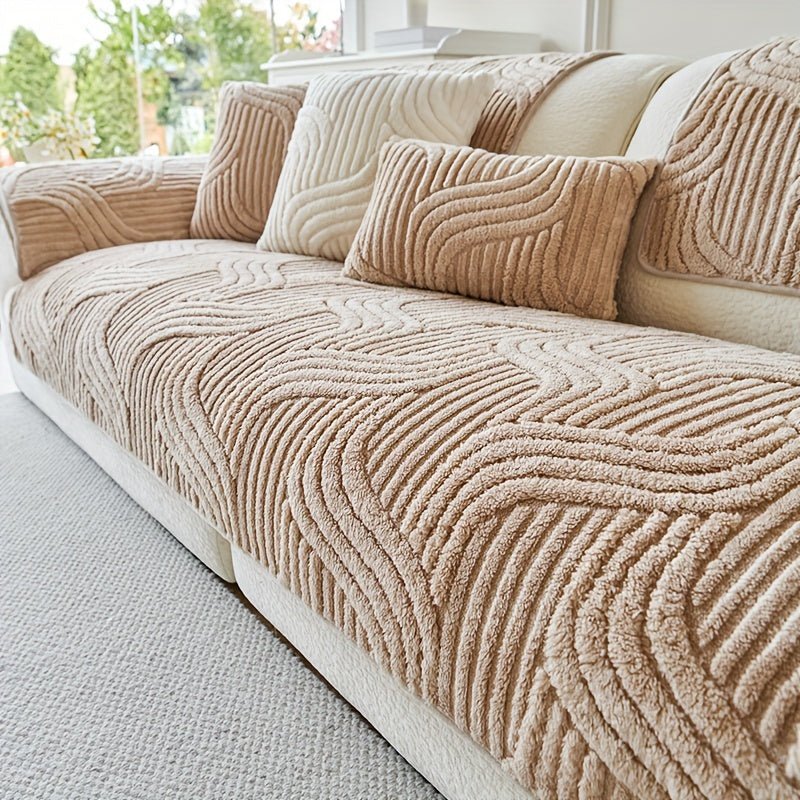 Beige textured sofa with matching cushions in a living room setting